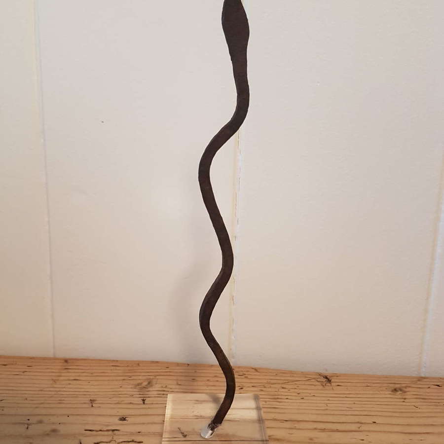 Lobi Iron Snake Currency on lucite stand - pointed head
